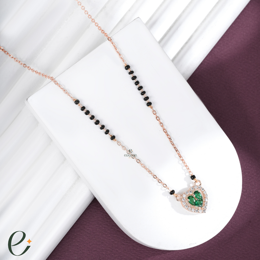 Necklace with heart-shaped green gemstone pendant