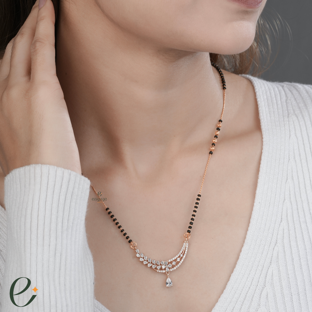 pear drop diamond mangalsutra with earrings for women